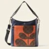 Carrymax Bucket Bag - Navy Puzzle Flower 1 Carrymax Bucket Bag - Navy Puzzle Flower -Orla Kiely 24SELLE835 4110 CarrymaxBucketBag NavyPuzzleFlowerEmblem1